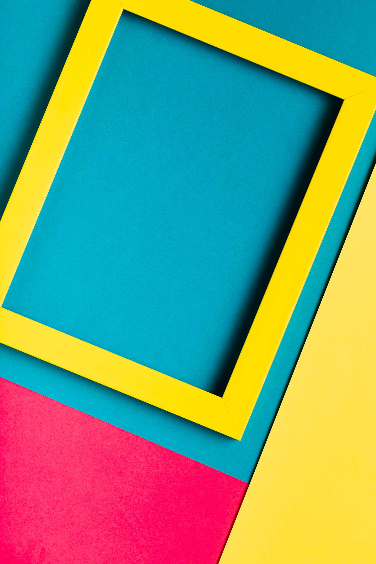 top-view-yellow-frame-colourful-background-web